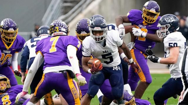 Tyler Mason (5) runs the ball up the middle during 2022 1A Football State Championship between #1 Tarboro Vikings and #4 Mount Airy Granite Bears on Saturday, December 10, 2022 at Carter-Finley Stadium. (Photo By: Carl Copeland / HighSchoolOT.com