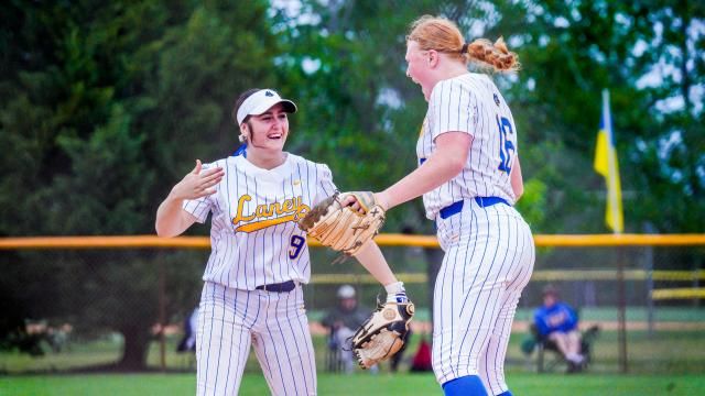 Brileigh Mathews and Makenzi Curry of Laney. Laney softball came from behind in the final three innings to defeat South Brunswick 3-2 on April 19, 2024 (Photo: Evan Moesta/HighSchoolOT.com)