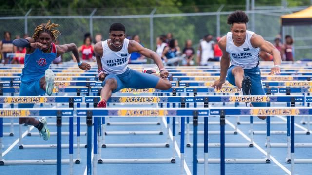 Desmond Smith (center) wins the 110 hurdles. The NCHSAA 2A and 4A Track & Field State Championships on the campus of North Carolina A&T State University on Friday May 19, 2023 (Photo: Evan Moesta/HighSchoolOT)